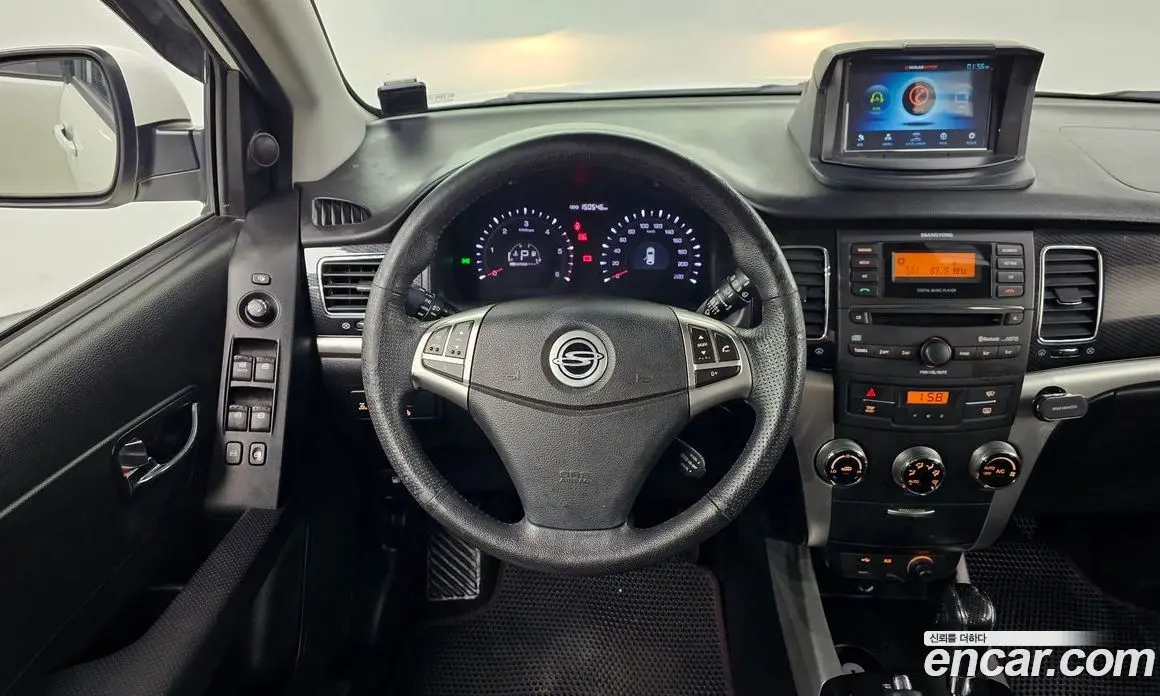 SsangYong Korando 2013 2.0 автомат (гидро), фото 13