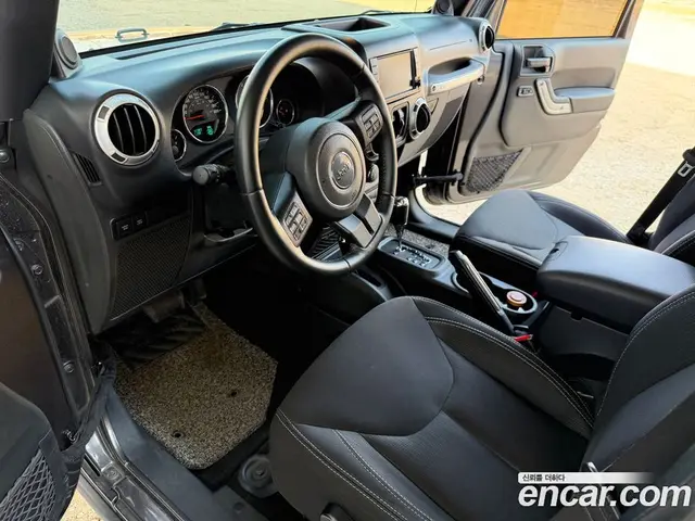 Jeep Wrangler 2014 2.8 автомат (гидро), миниатюра 7