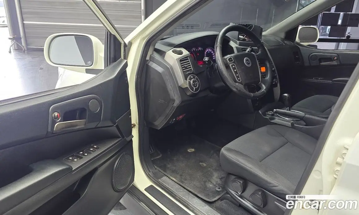 SsangYong Korando 2013 2.0 автомат (гидро), фото 11