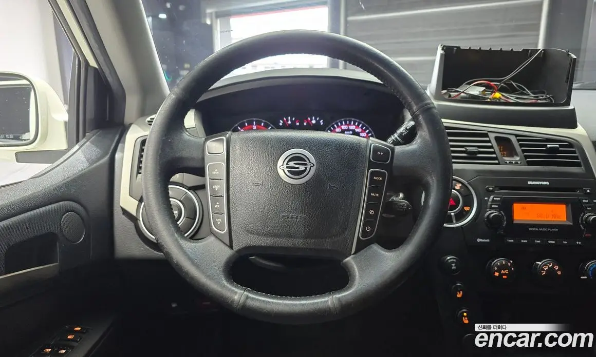 SsangYong Korando 2013 2.0 автомат (гидро), фото 14