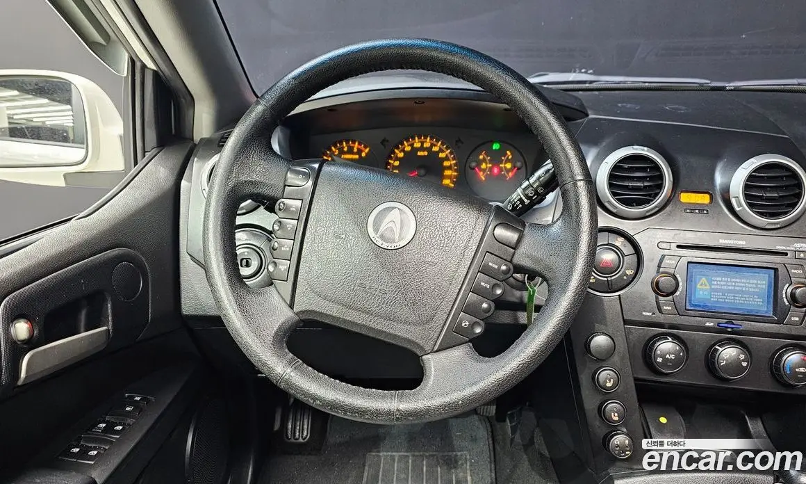 SsangYong Actyon 2009 2.0 автомат (гидро), фото 13