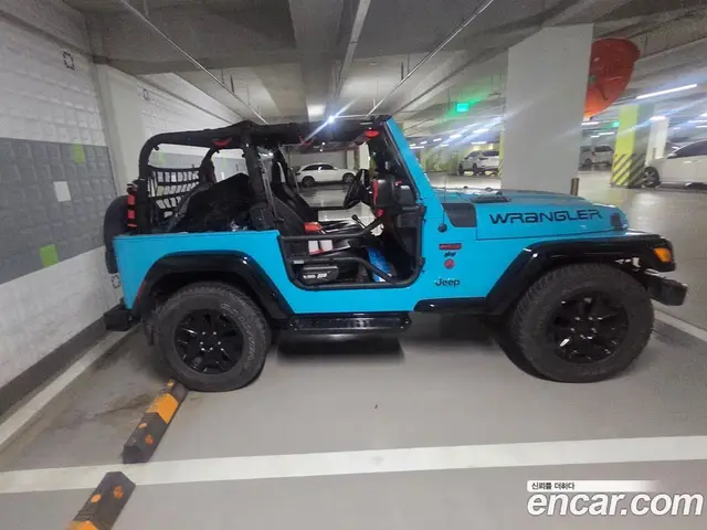 Jeep Wrangler 1997 2.5 механика, миниатюра 3
