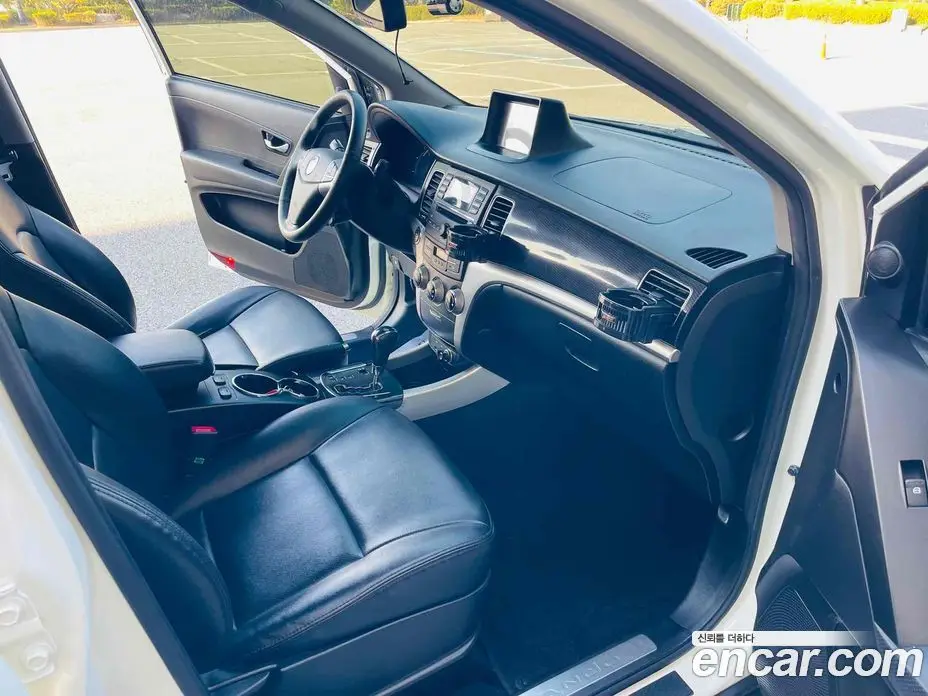 SsangYong Korando 2013 2.0 автомат (гидро), фото 10