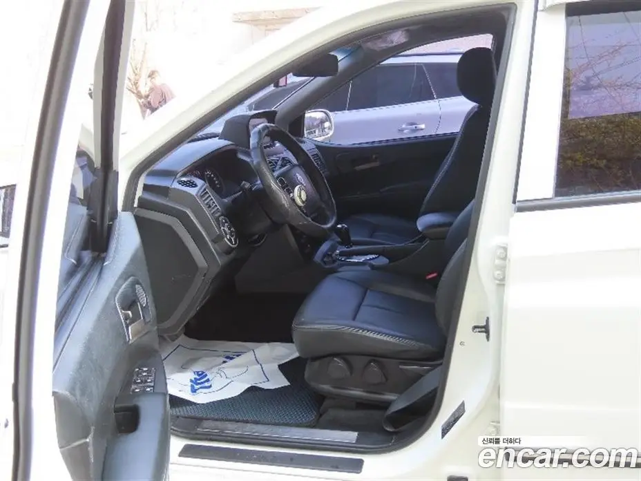 SsangYong Korando 2014 2.0 автомат (гидро), фото 13