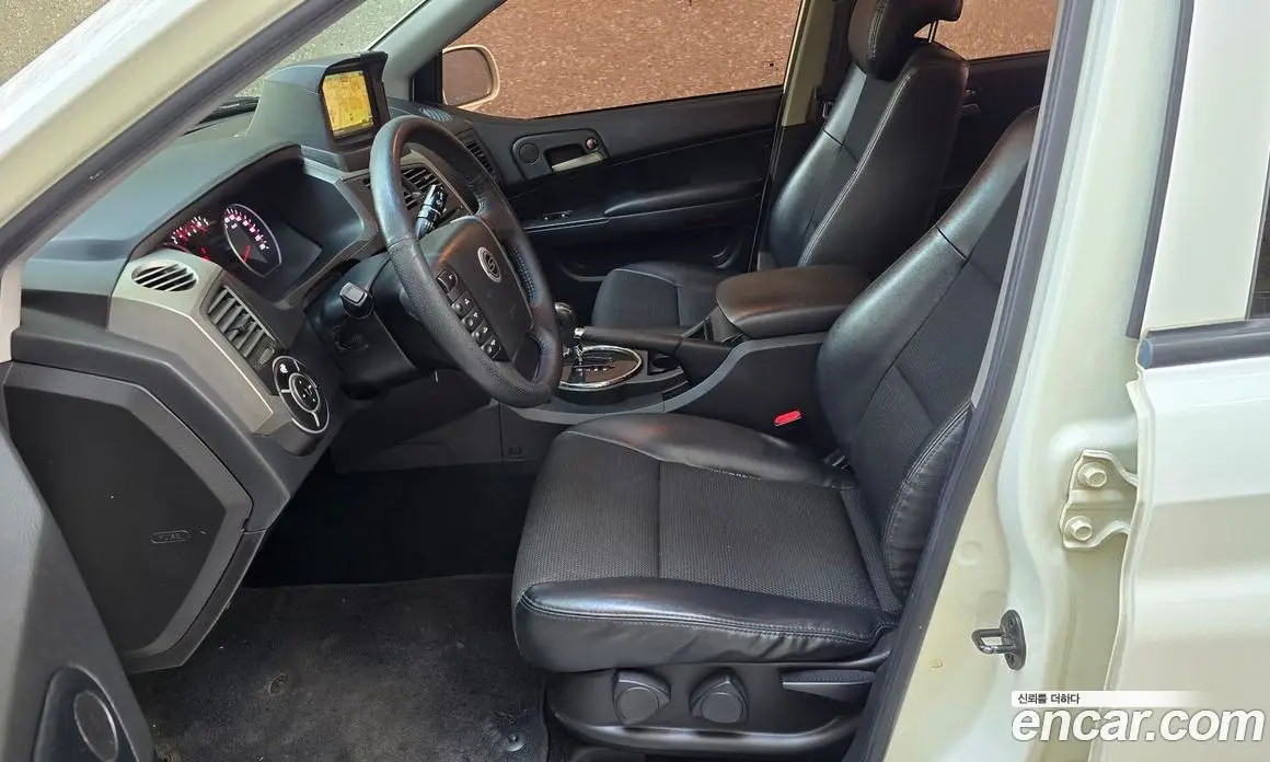 SsangYong Korando 2012 2.0 автомат (гидро), фото 6