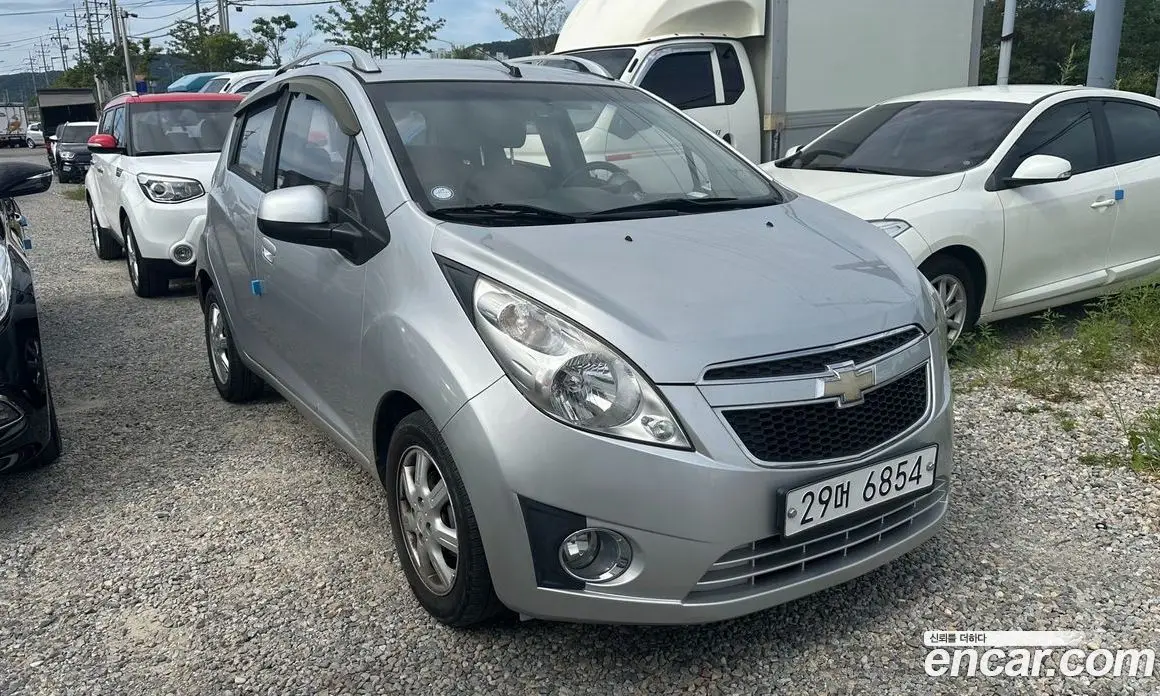 Chevrolet Spark 2011 1.0 автомат (гидро), фото 6