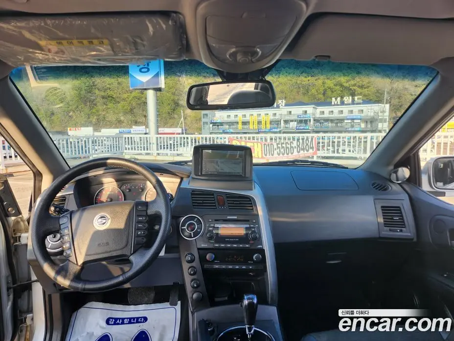 SsangYong Korando 2012 2.0 автомат (гидро), фото 16