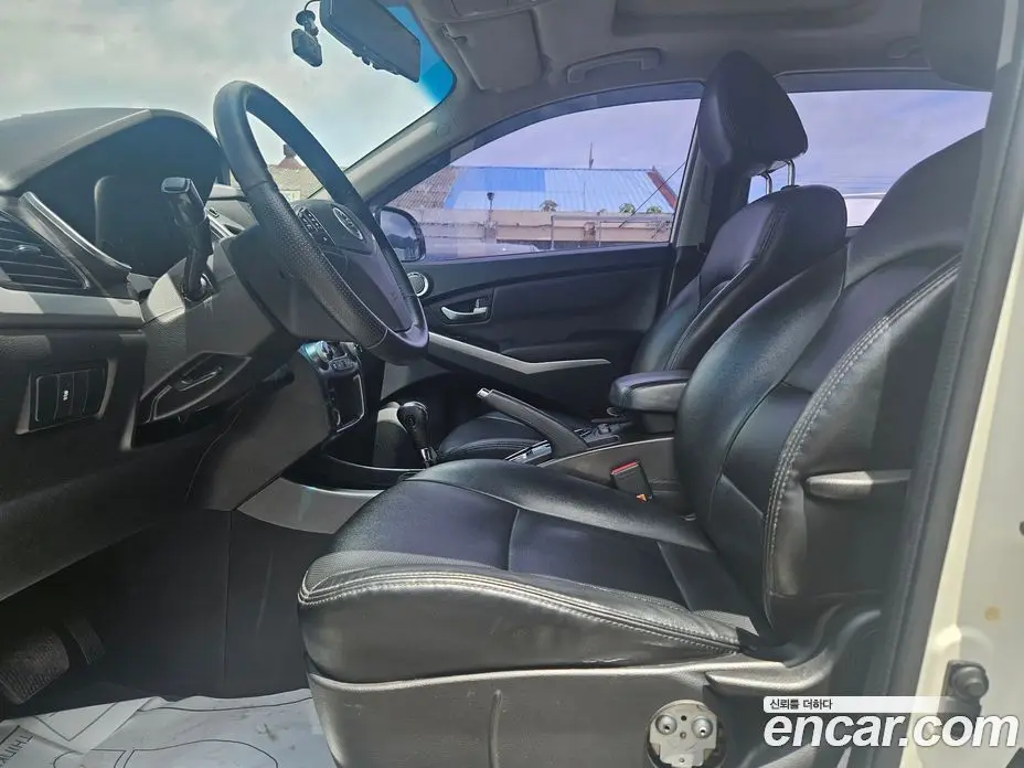 SsangYong Korando 2013 2.0 автомат (гидро), фото 11
