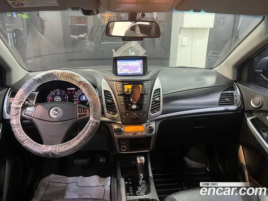 SsangYong Korando 2014 2.0 автомат (гидро), фото 7