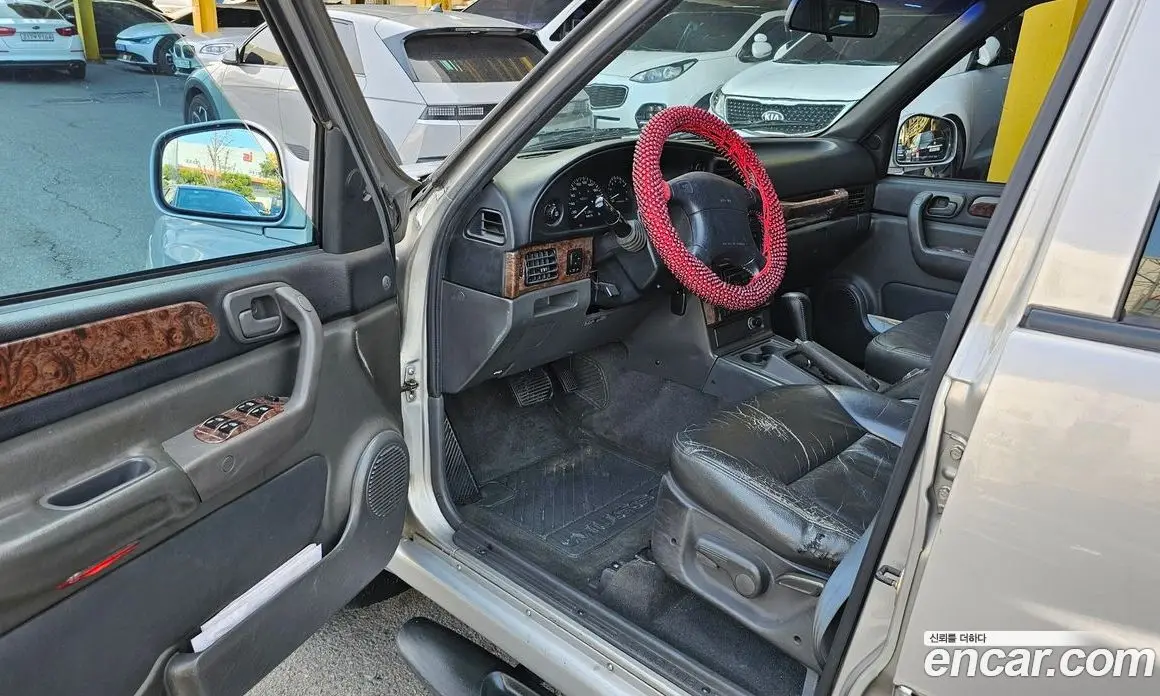 SsangYong Musso 1997 2.3 автомат (гидро), фото 8 SsangYong Musso 1997 2.3 автомат (гидро), фото 8