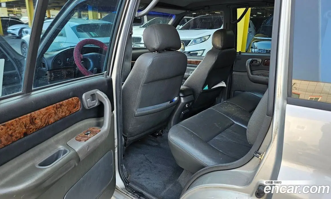 SsangYong Musso 1997 2.3 автомат (гидро), фото 9 SsangYong Musso 1997 2.3 автомат (гидро), фото 9