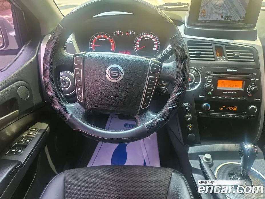 SsangYong Korando 2014 2.0 автомат (гидро), фото 10