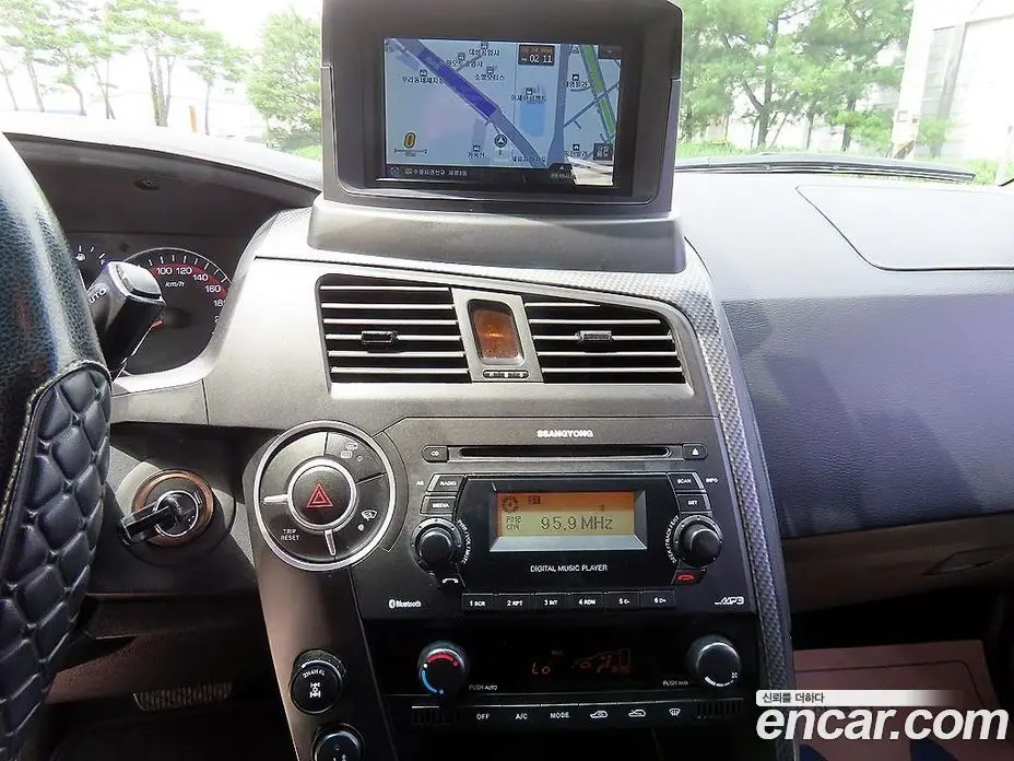 SsangYong Korando 2014 2.0 автомат (гидро), фото 14