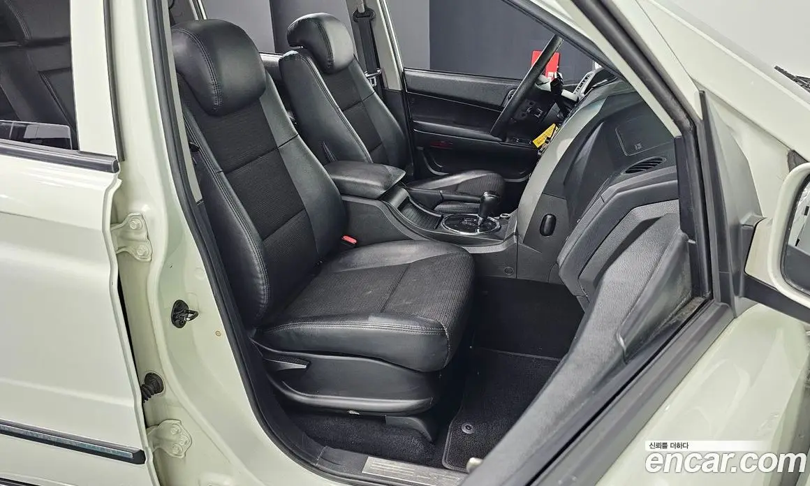 SsangYong Korando 2013 2.0 автомат (гидро), фото 13