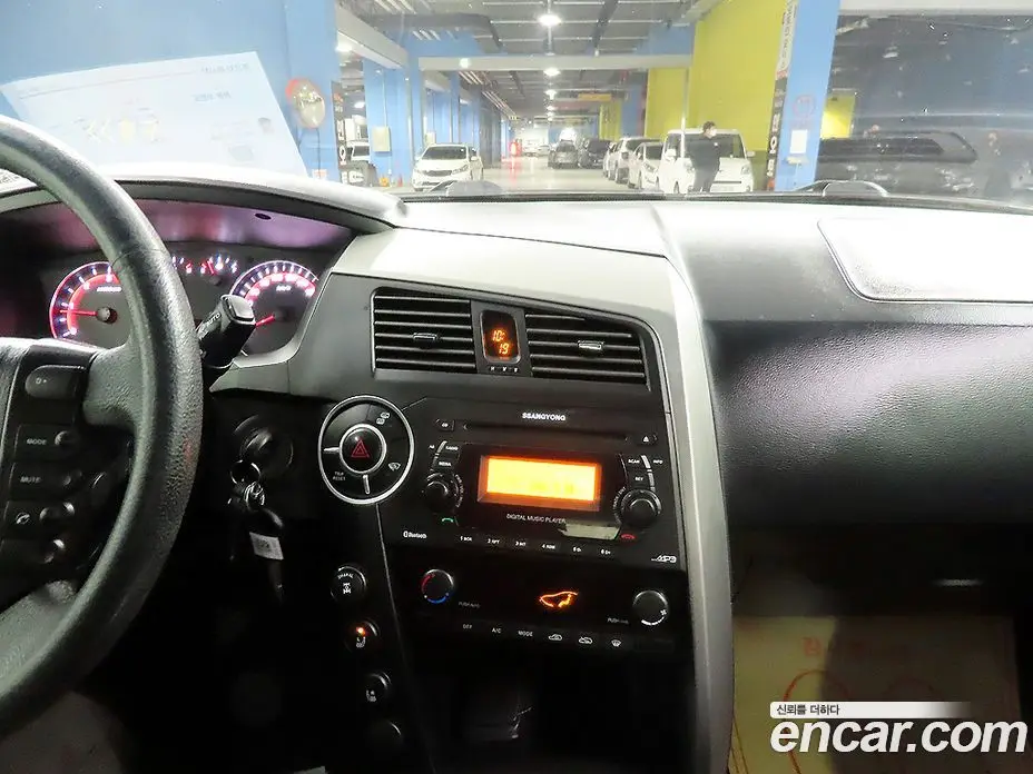 SsangYong Korando 2013 2.0 автомат (гидро), фото 12
