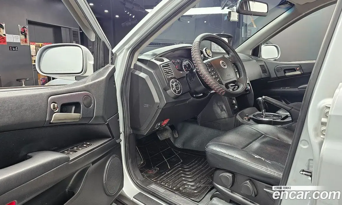 SsangYong Korando 2012 2.0 автомат (гидро), фото 13
