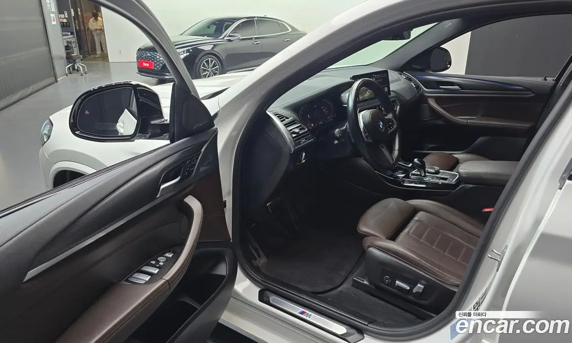 BMW X4 2023 2.0 автомат (гидро), фото 13