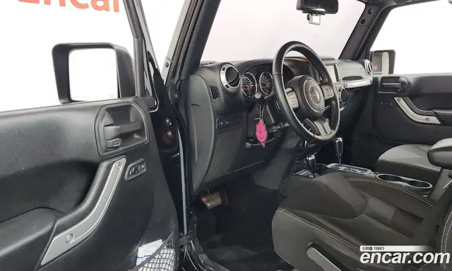 Jeep Wrangler 2016 3.6 автомат (гидро), миниатюра 12