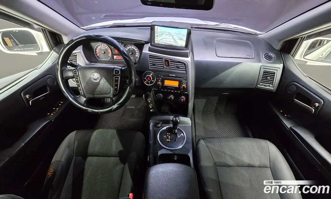 SsangYong Korando 2013 2.0 автомат (гидро), фото 10