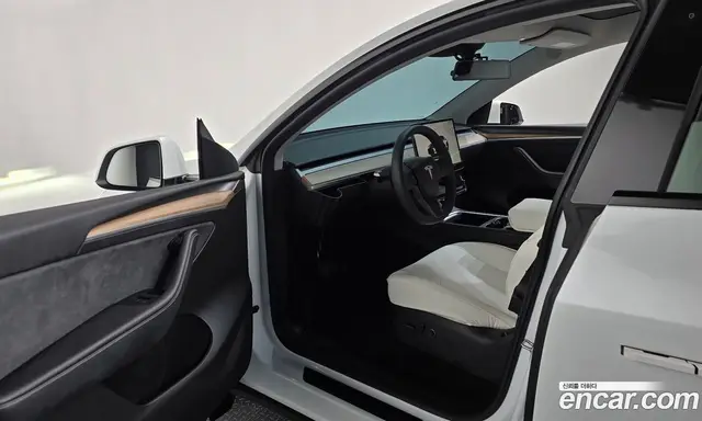 Tesla Model Y 2023 0.2 автомат (гидро), миниатюра 12