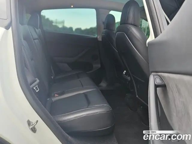 Tesla Model Y 2023 0.2 автомат (гидро), миниатюра 12