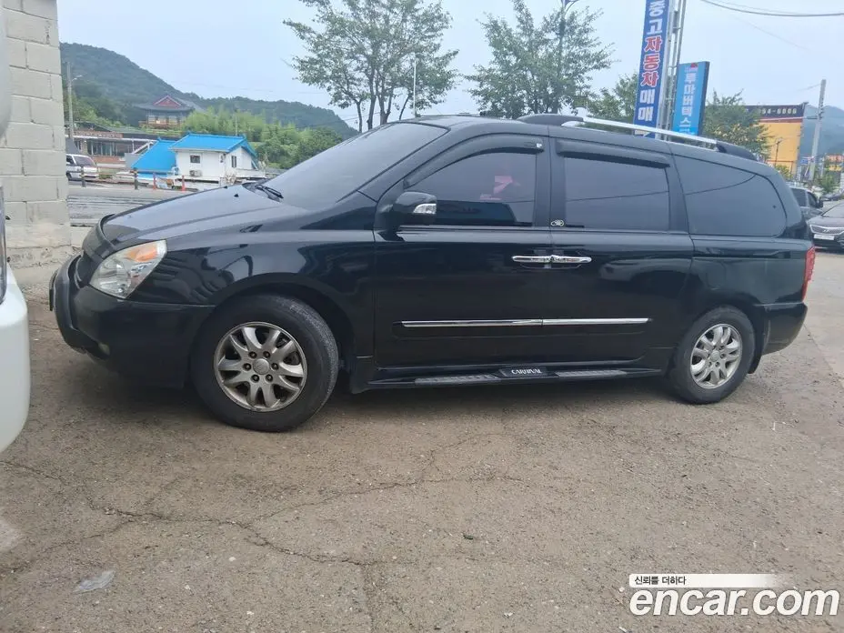 Kia Carnival 2013 2.2 автомат (гидро), фото 1 Kia Carnival 2013 2.2 автомат (гидро), фото 1