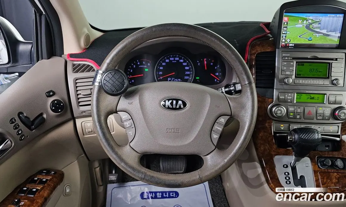 Kia Carnival 2012 2.2 автомат (гидро), фото 14