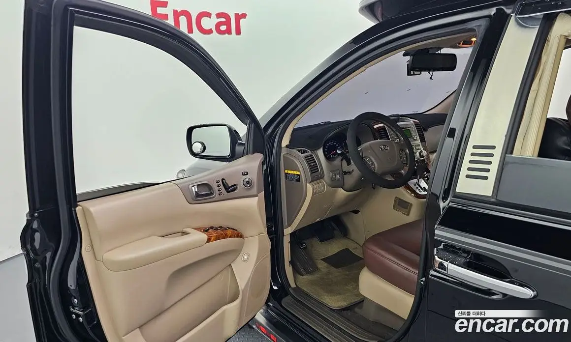 Kia Carnival 2013 2.2 автомат (гидро), фото 10 Kia Carnival 2013 2.2 автомат (гидро), фото 10