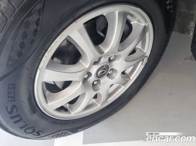 Kia Opirus 2011 2.7 автомат (гидро), миниатюра 5
