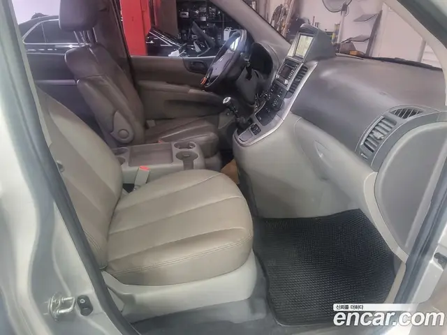 Kia Carnival 2010 2.2 механика, миниатюра 10 Kia Carnival 2010 2.2 механика, миниатюра 10