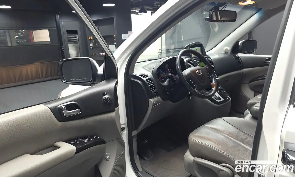 Kia Carnival 2013 2.2 автомат (гидро), фото 13