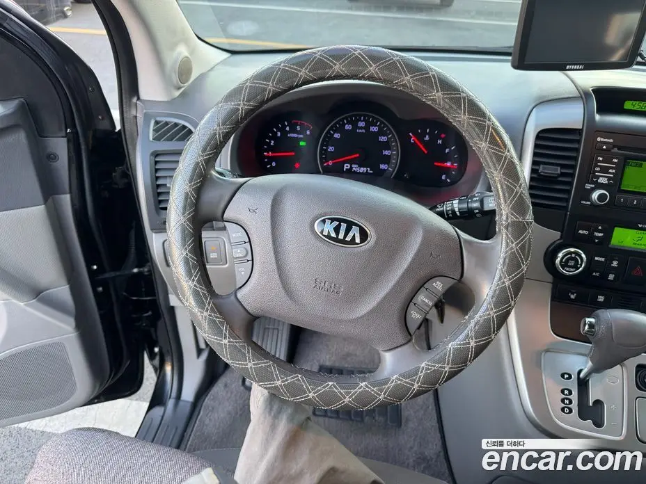Kia Carnival 2013 2.2 автомат (гидро), фото 9
