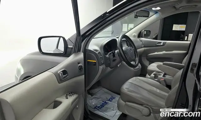 Kia Carnival 2012 2.2 автомат (гидро), миниатюра 10