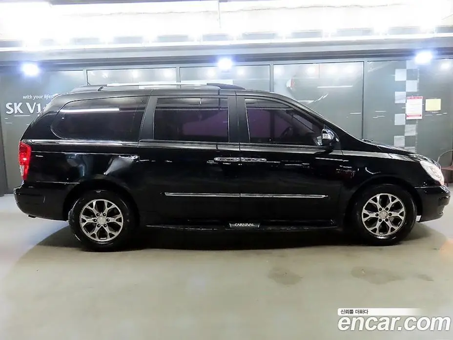 Kia Carnival 2013 2.2 автомат (гидро), фото 10 Kia Carnival 2013 2.2 автомат (гидро), фото 10