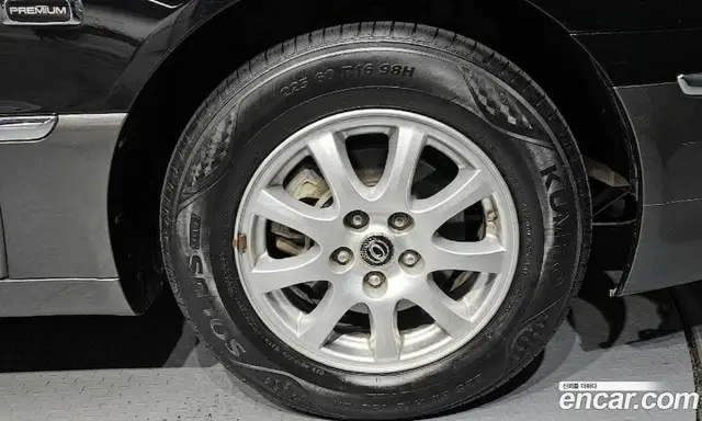 Kia Opirus 2009 2.7 автомат (гидро), миниатюра 5
