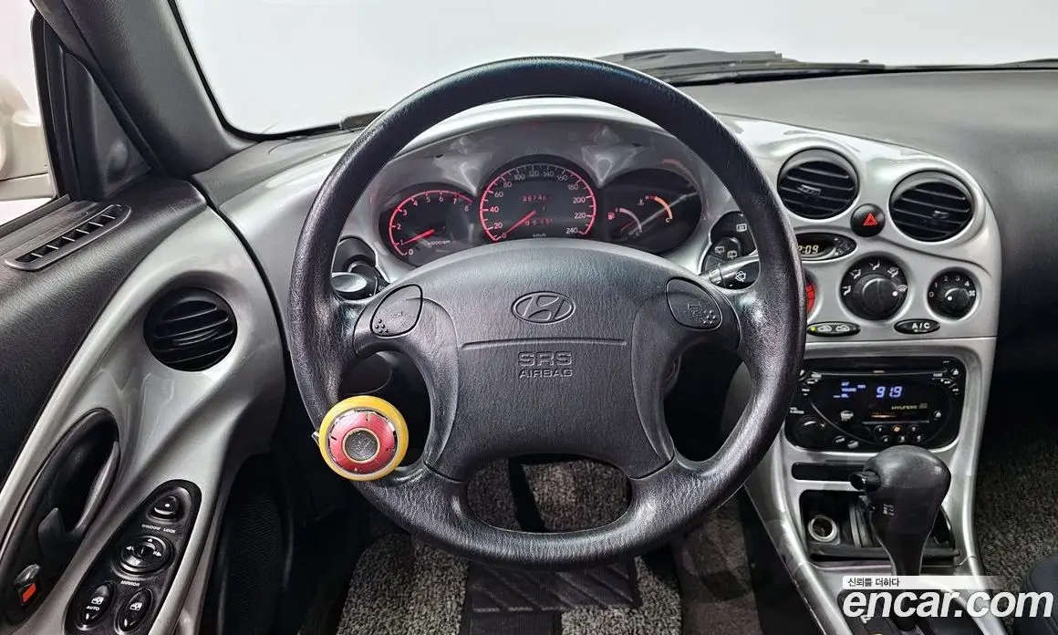 Hyundai Tiburon 1997 2.0 автомат (гидро), фото 12