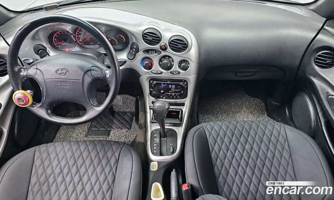 Hyundai Tiburon 1997 2.0 автомат (гидро), фото 7