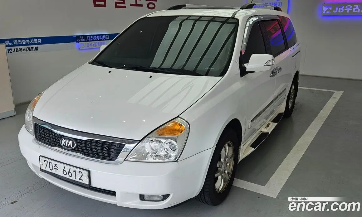 Kia Carnival 2012 2.2 автомат (гидро), фото 2 Kia Carnival 2012 2.2 автомат (гидро), фото 2