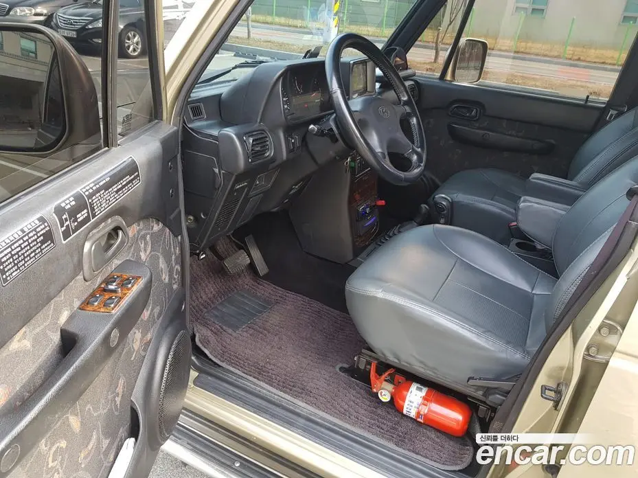 Hyundai Galloper 2000 2.5 автомат (гидро), фото 10