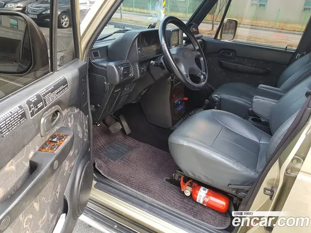 Hyundai Galloper 2000 2.5 автомат (гидро), миниатюра 10