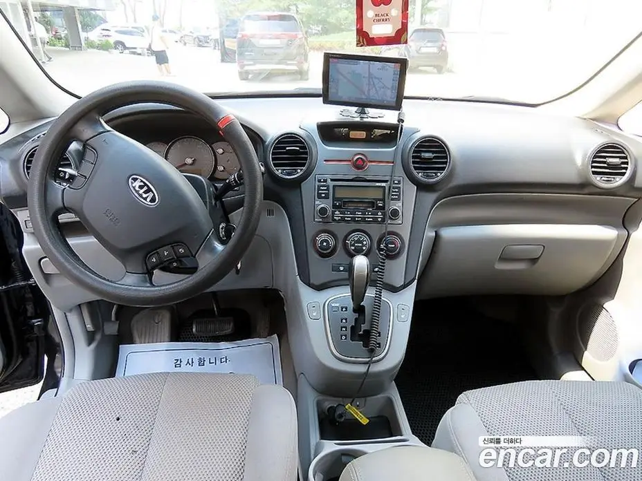 Kia Carens 2007 2.0 автомат (гидро), фото 7