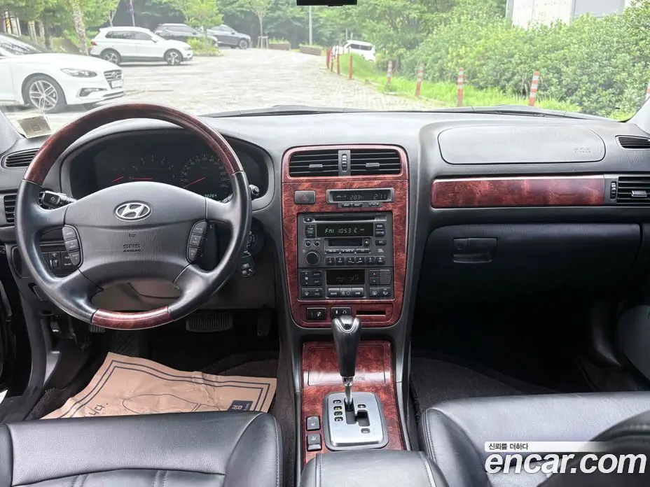 Hyundai Grandeur 2004 3.0 автомат (гидро), фото 15 Hyundai Grandeur 2004 3.0 автомат (гидро), фото 15