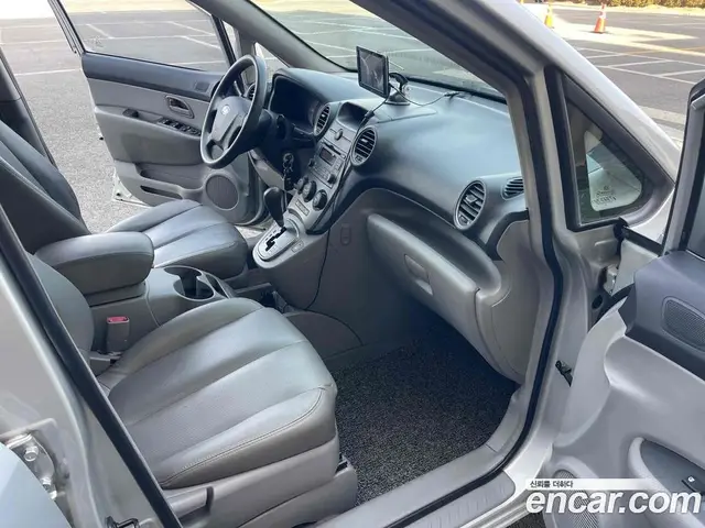 Kia Carens 2007 2.0 автомат (гидро), миниатюра 11