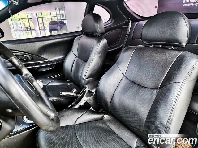 Hyundai Tiburon 1999 2.0 МКПП, миниатюра 7