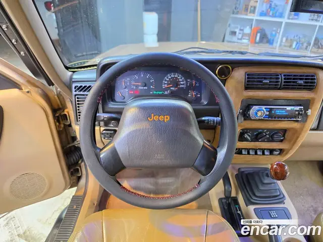 Jeep Cherokee 1999 2.5 МКПП, миниатюра 9