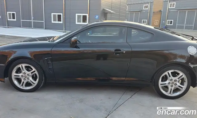 Hyundai Tuscani 2004 2.0 АКПП, миниатюра 12